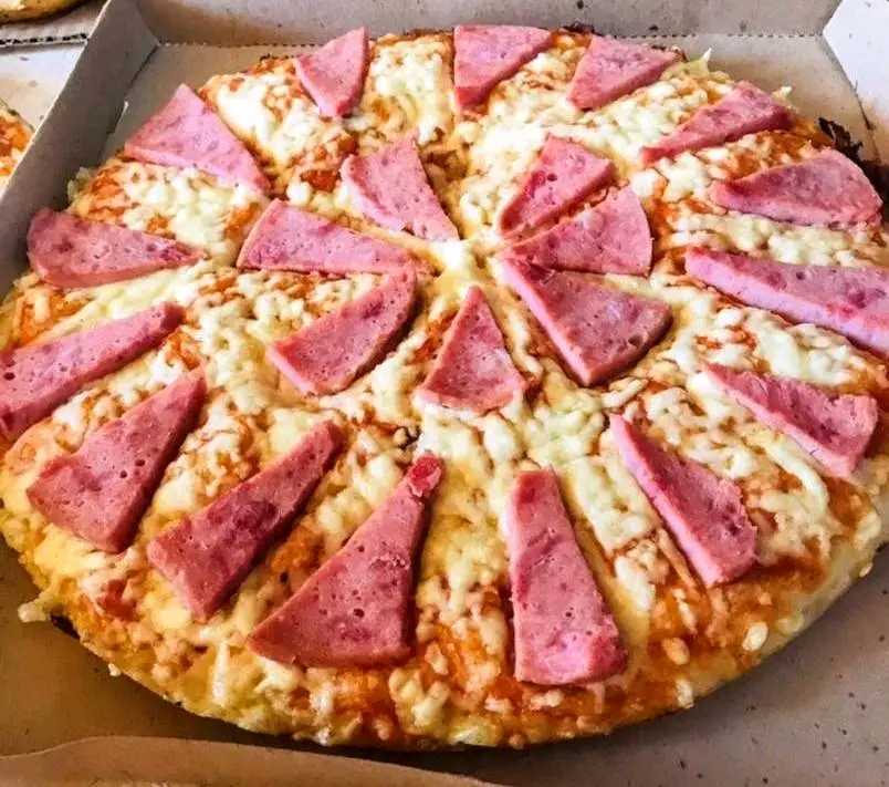 Pizza con  jamon pierna