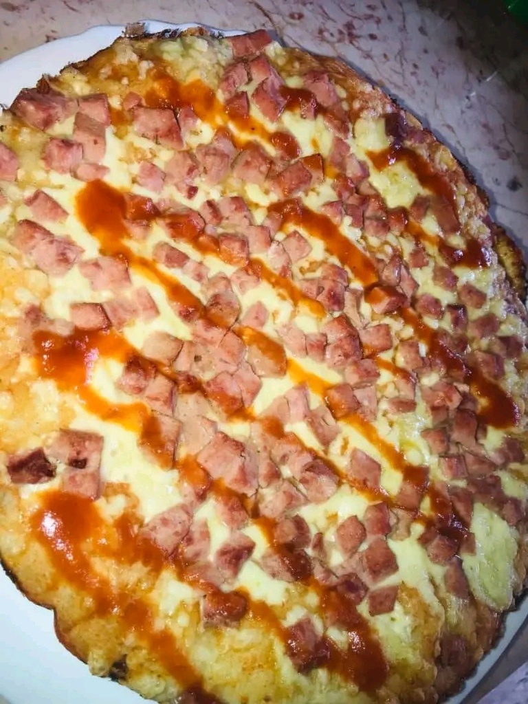 Pizza con  jamón pierna
