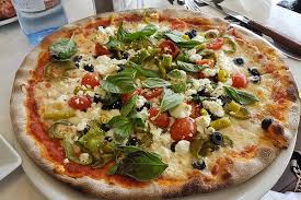 Pizza Marbella (atún, piña y cebolla)