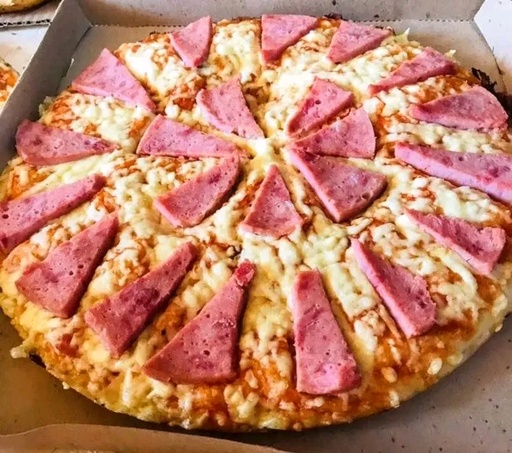 Pizza con  jamon pierna